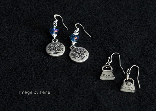 Left to Right -- Tree – base metal and crystal with silver plated ear wires. Purses – base metal with silver plated ear wires.