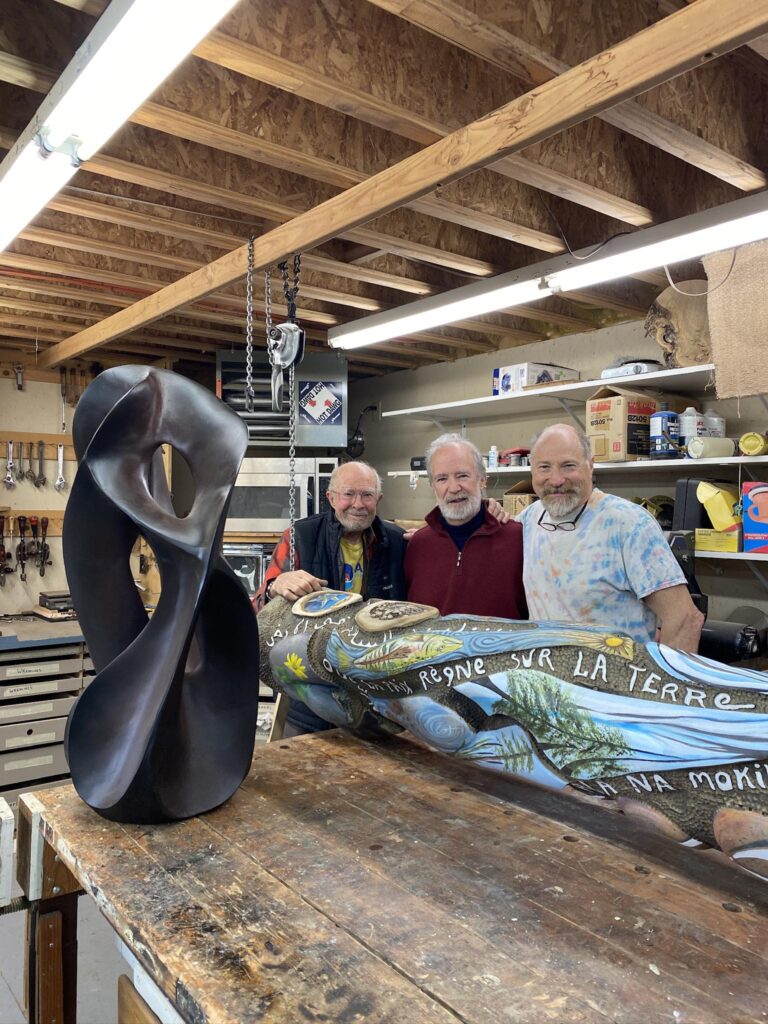 The artists behind the Peace Pole -- John Barany, Randal Leek, and Doug Lewis.